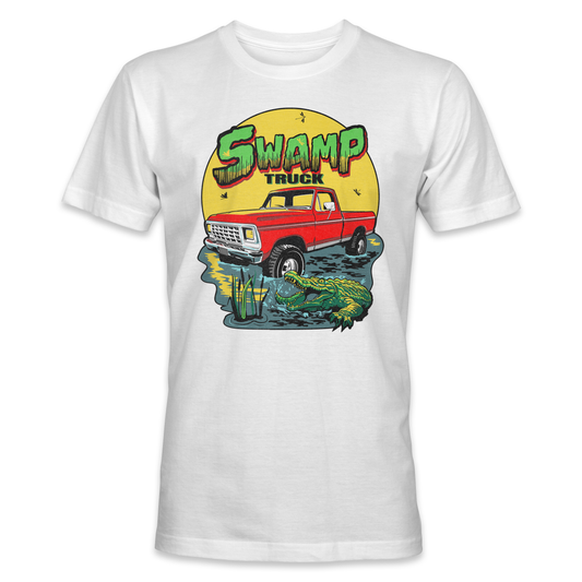 A white t-shirt with a swamp truck design featuring a Ford F100 truck in a swamp with a gator and a logo of a gator’s head. Swamp truck t-shirt in black color with a classic Ford F100 truck sitting in a swamp with a gator and a Swamp Truck title. A t-shirt design of a gator trying to bite a Ford F100 truck in a swamp with a Swamp Truck title and logo in white color.